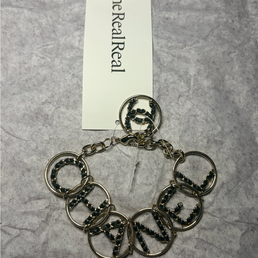 Chanel CC Logo Gold Tone Metal Woven Black Leather Letters Bracelet